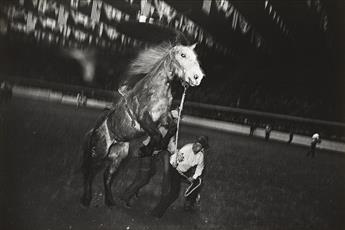 GARRY WINOGRAND (1928-1984) Fort Worth, Texas, from the Fort Worth Stock Show and Rodeo series.                                                  
